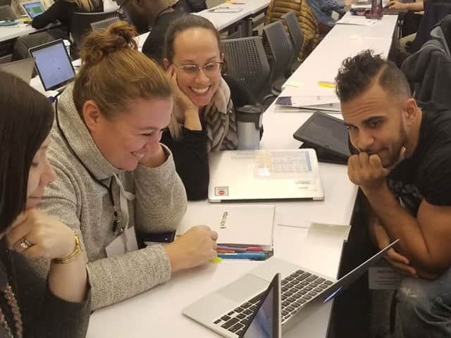 teachers working together in a professional development workshop